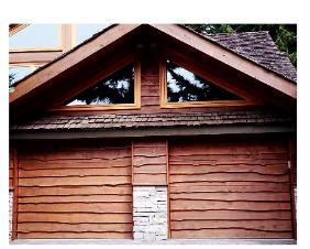 Custom Garage Doors with your choice of wood and beautiful Stain Finishes